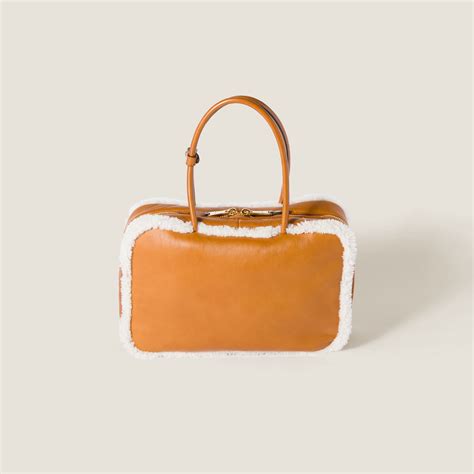 miu miu 148 bag|Cognac/natural Beau Shearling Top.